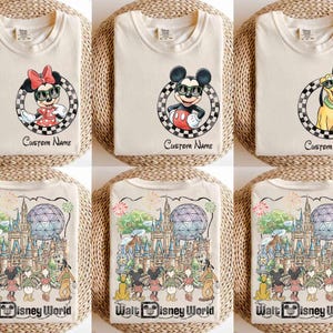 May include: Cream-colored t-shirts featuring Disney characters: Minnie Mouse, Mickey Mouse, and Pluto, each wearing sunglasses within a checkered circle. The text "Custom Name" appears below. Other shirts display a colorful Walt Disney World scene.