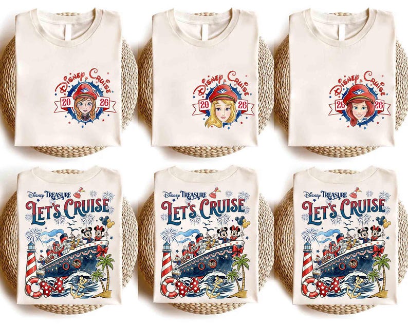 May include: Off-white t-shirts featuring Disney Cruise 2026 graphics with character portraits on the chest and a large Disney Treasure Let's Cruise design on the back, including a cruise ship, lighthouse, palm trees, and Mickey and Minnie Mouse.
