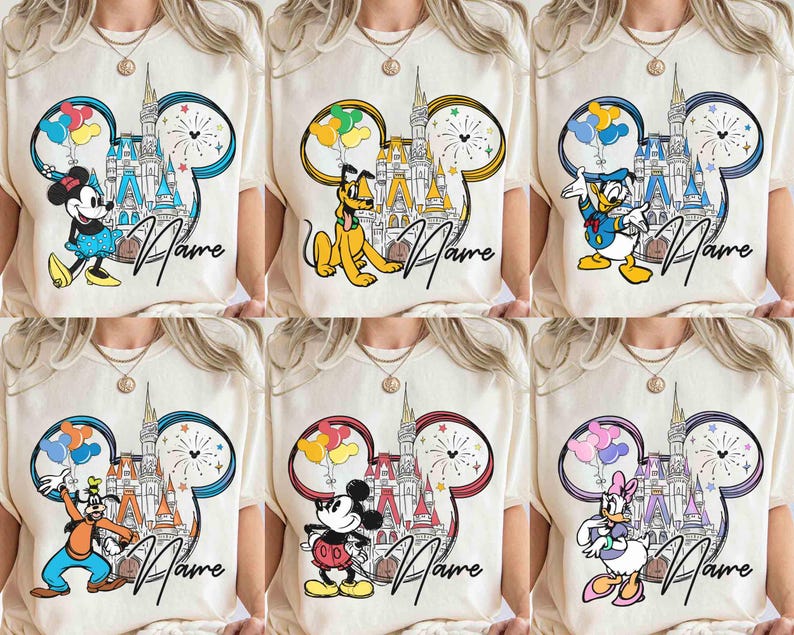 May include: Six cream colored t-shirts with a Mickey Mouse ear design featuring different Disney characters. Each shirt has a castle, fireworks, and balloons. The text "Name" is printed on each shirt.