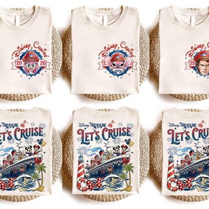 May include: Off-white t-shirts featuring Disney Cruise 2026 graphics with various character portraits on the chest, and Disney Treasure Let's Cruise designs with a cruise ship, lighthouse, and Mickey and Minnie Mouse on the main print.