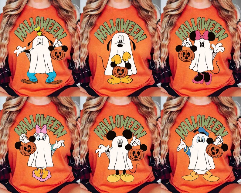May include: Orange Halloween t-shirts featuring cartoon characters dressed as ghosts, each holding a jack-o'-lantern. The word "HALLOWEEN" is printed above the characters in green. Characters include Mickey Mouse, Minnie Mouse, Donald Duck, and Goofy.