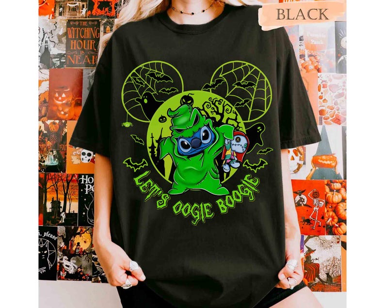 May include: Black t-shirt featuring a green graphic of Stitch dressed as Oogie Boogie, with the text "Let's Oogie Boogie." The design includes Mickey Mouse ears, spiderwebs, and bats, perfect for Halloween. The word "BLACK" is printed at the top.