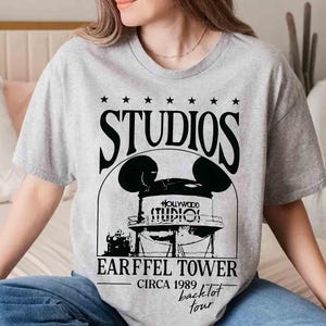 May include: A rustic wooden sign with the text "Welcome to our home" in white lettering. The sign features a distressed finish and a simple, inviting design, perfect for entryway decor.