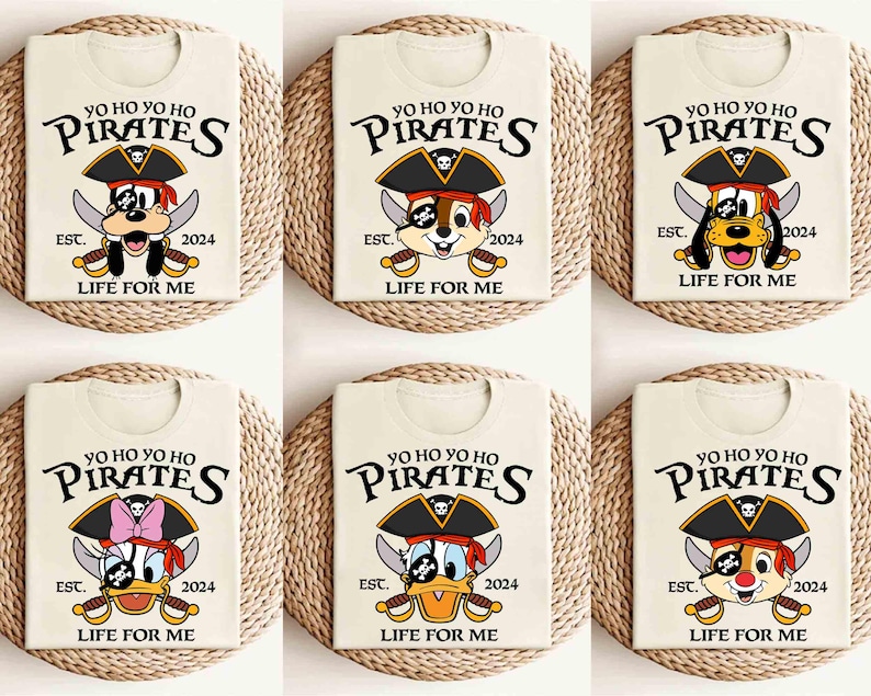 May include: Six white t-shirts with a cartoon pirate dog and duck design. The shirts feature the text "Yo Ho Yo Ho Pirates" and "Est. 2024 Life For Me".