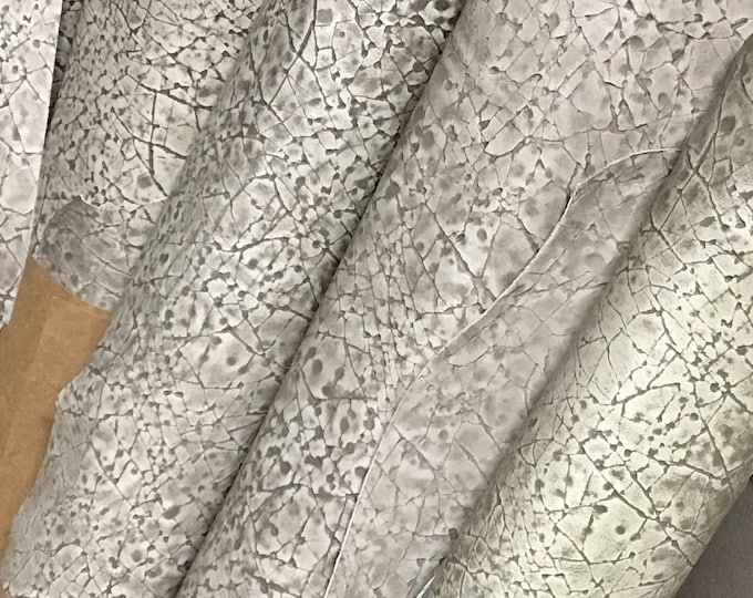 Smoke White Embossed Cork Pattern Leather Cowhides.  TOWN710
