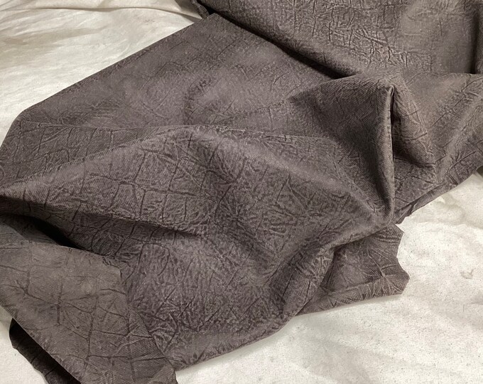 Brown Embossed Gator a leather Lambskin.  OSM20555