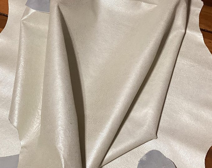14 square feet Pearl White Embossed Cowhide Remnant. CA703