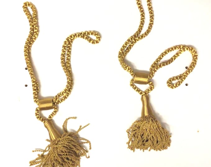 Carton of 12 Gold 24 inch Curtain Tiebacks with 5 1/2 tassels.  TD05