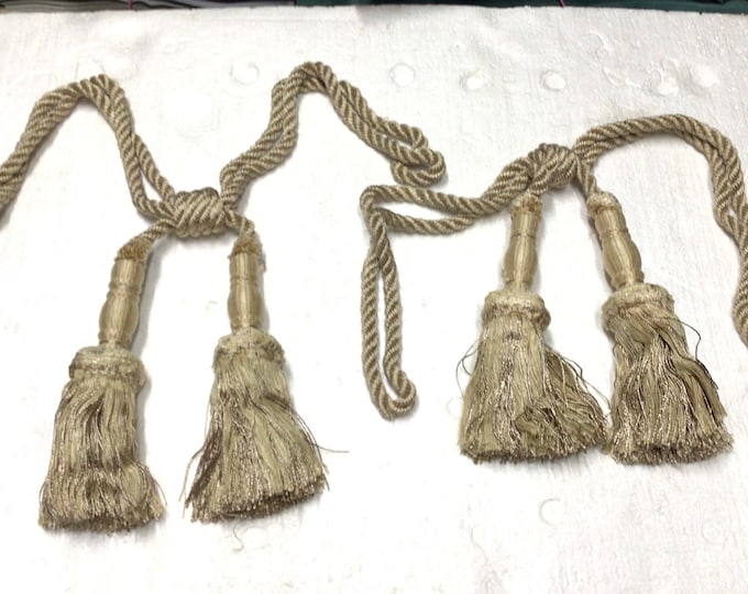Package of Champagne Color 30 Inch Curtain Tiebacks. DW34