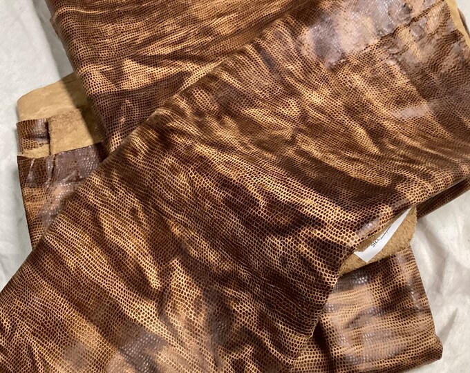 Embossed Small Pebbled Light and Medium Brown Leather Remnants.  1001