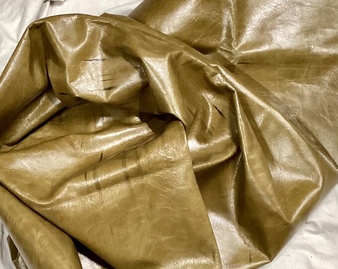20 square feet olive green leather cowhide.  DD2113