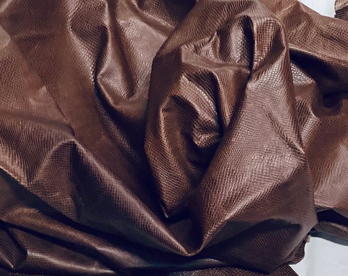 Brown Embossed Sidewinder Leather Cowhide.  11DRW