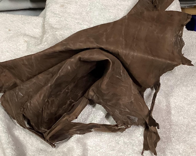 Brown Distressed Embossed Leather Lambskin. OSM10255