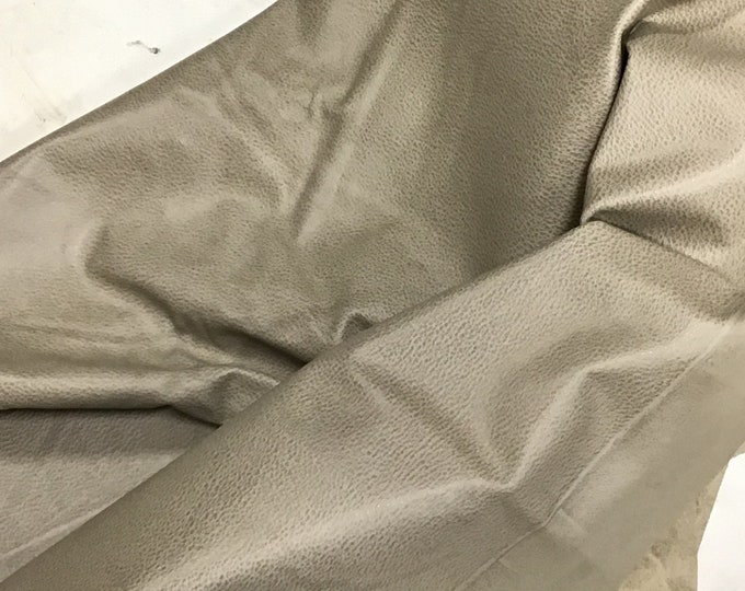 Taupe embossed Pebble Grain Leather Cowhide Partials.  DD1348