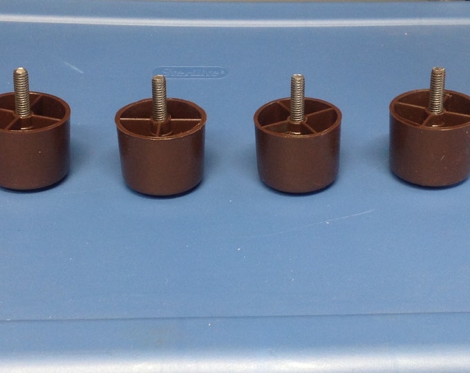 Brown plastic furniture legs 1 1/2" in packages of 4 FLBR02