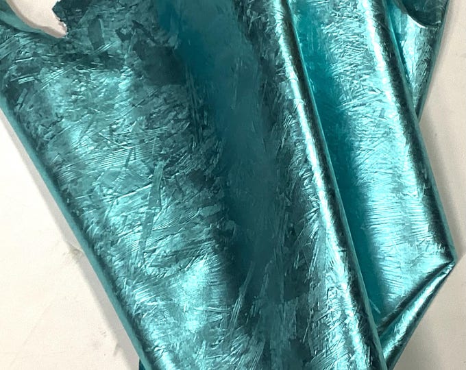 Metallic Ice Blue Embossed Leather Lambskin.  OSM20510
