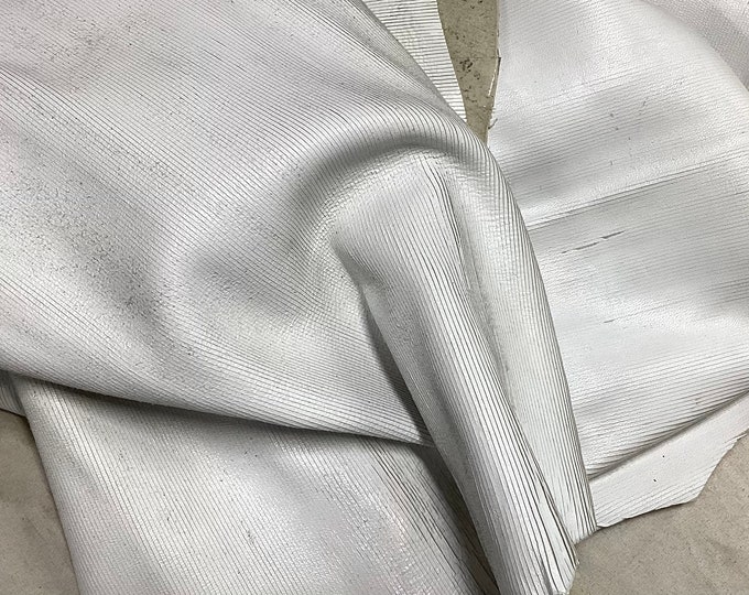 Linear Cut White Leather Lambskins.  OSM10225