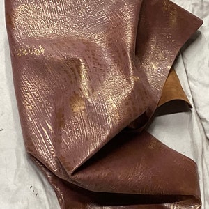 Golden Cinnamon Embossed Gator leather Lambskin.  OSM871