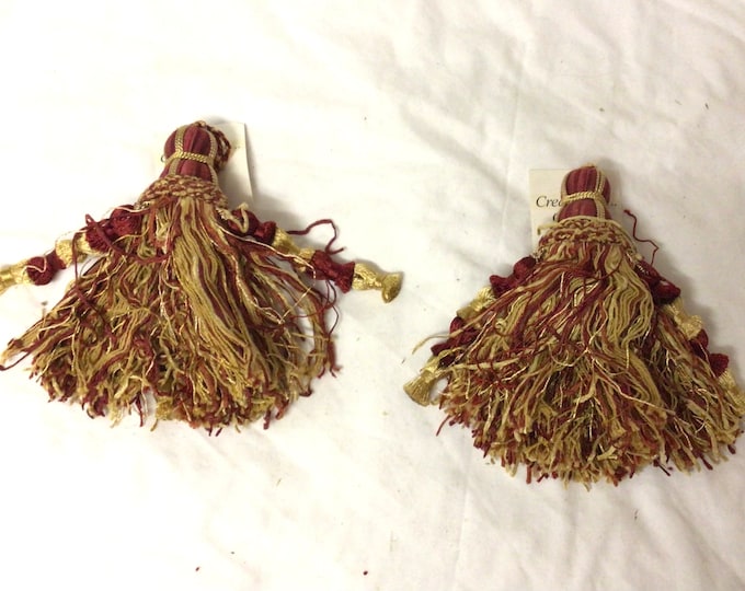 Package of 2 Gold and Red 7 Inch Tassels.  TBYN09
