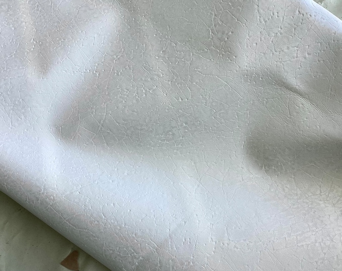 Bright White Embossed Cork Pattern Leather Cowhides.  MRH2761