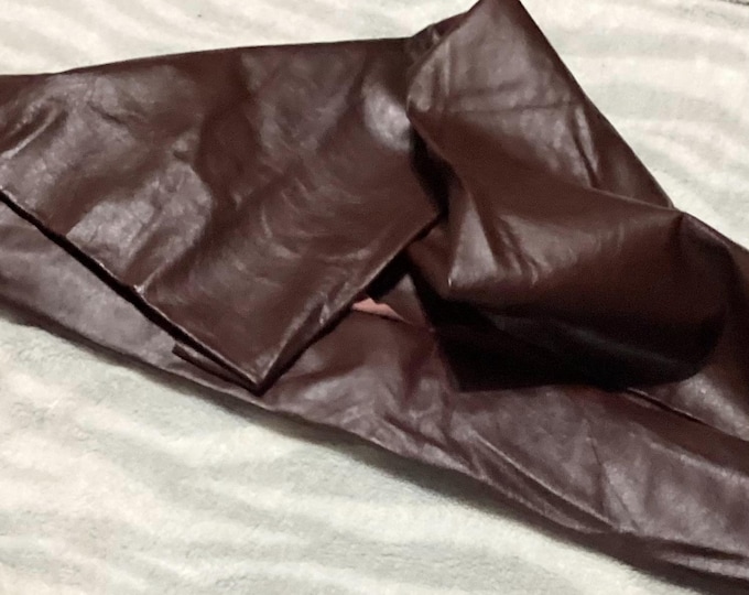 53 square feet Maroon Leather Cowhide.