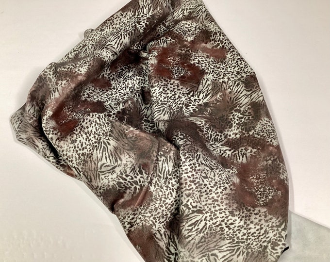 Browns and White Printed Leather Lambskins,  leather hides.  OSM07706