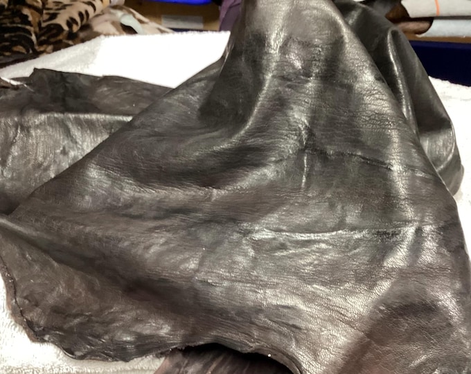 Dark Brown Embossed Leather Lambskin.  OSM10180
