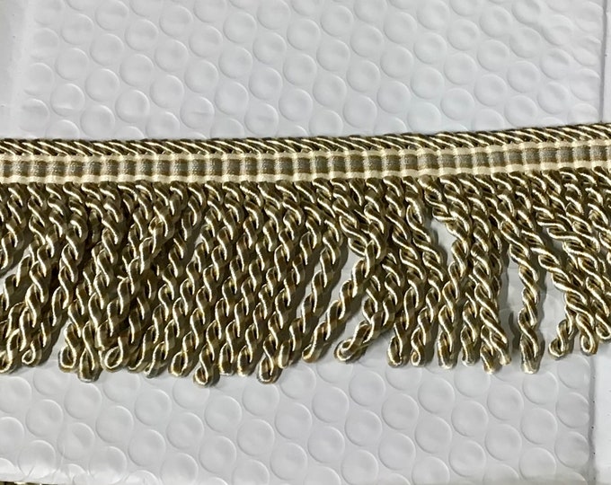 Gold and Cream with light Blue Bullion Fringr in 12 yard bolts. Upholstery Trim. LX03A