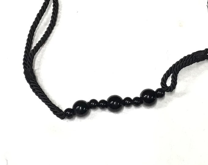 Package of 2 Black 28 inch Curtain Tiebacks. DW22