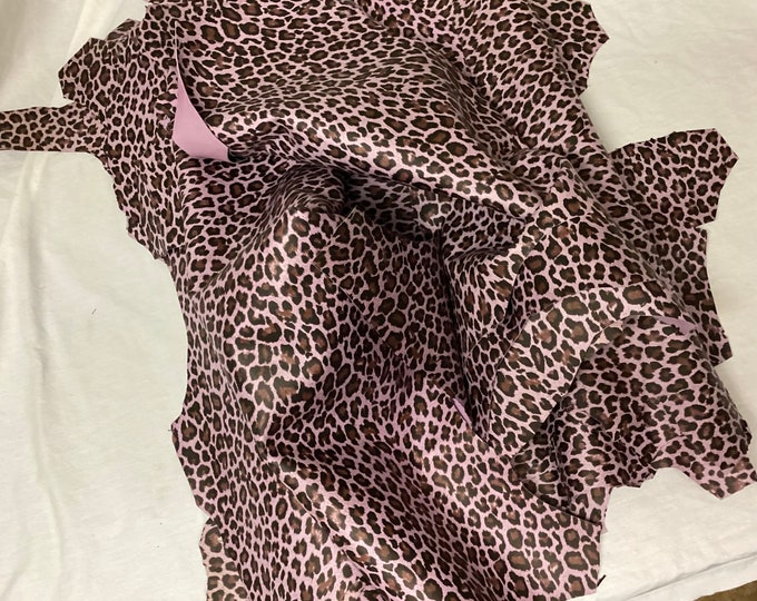 Cheetah Print Leather Lambskins with Smooth,Slick Surface.and Pink Hue Background. OSM1638