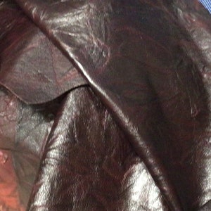 Embossed Galaxy Bordeaux Leather Lambskins.  LAMB7301
