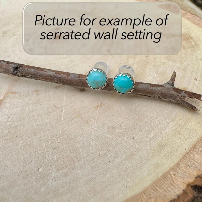 May include: Two turquoise stud earrings with a serrated silver setting are displayed on a small, brown twig. The earrings are round and have a bright, polished appearance. The image includes text that reads "Picture for example of serrated wall setting."