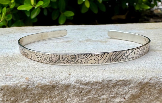 Flower doodle imprinted sterling silver cuff bracelet