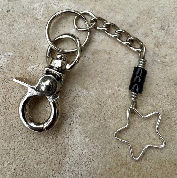 Keychain with black onyx gemstone and sterling silver star