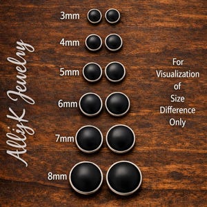 May include: A wooden surface displays a collection of black stud earrings in various sizes, ranging from 3mm to 8mm. Each pair is accompanied by a size label. The text "For Visualization of Size Difference Only" is also present.