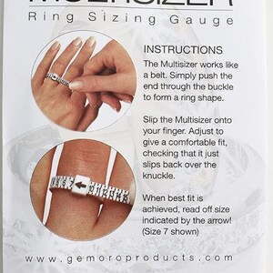 May include: White plastic ring sizer tool with a white background. The tool is shaped like a belt with a buckle and a numbered scale. The instructions on the background explain how to use the tool to measure ring size.