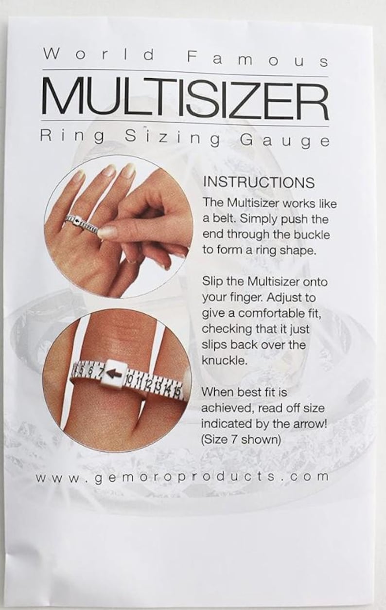 May include: White plastic ring sizer tool with a white background. The tool is shaped like a belt with a buckle and a numbered scale. The instructions on the background explain how to use the tool to measure ring size.