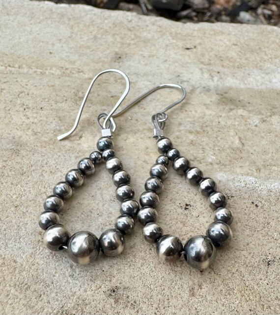 Navajo pearl hoop teardrop style, sterling silver earrings