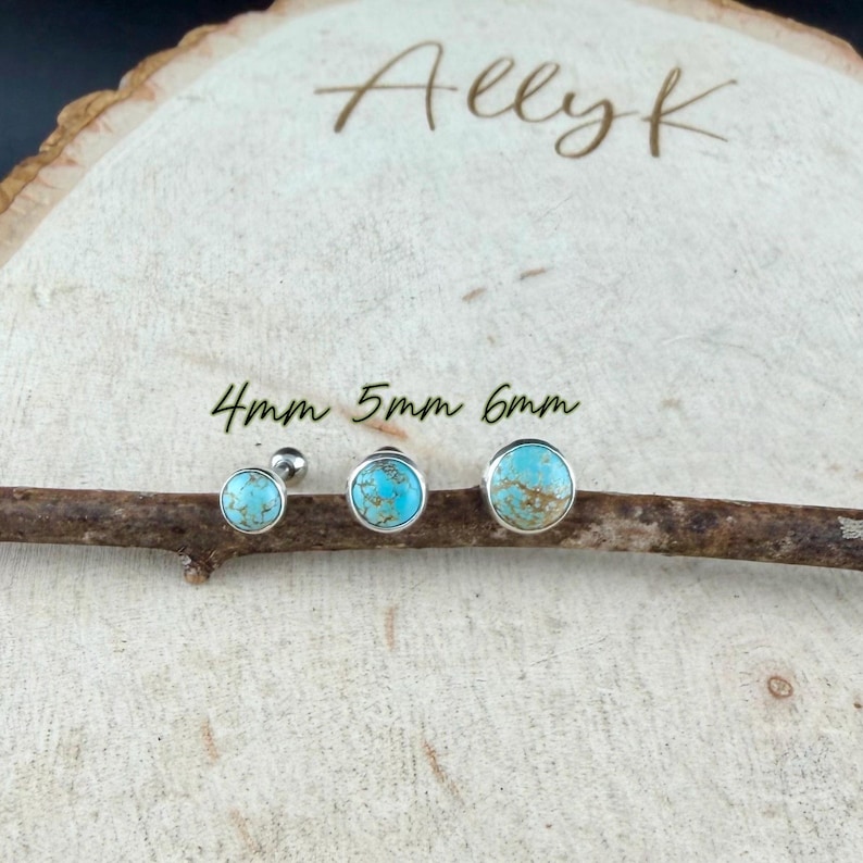 May include: Three turquoise stud earrings in sizes 4mm, 5mm, and 6mm, displayed on a wooden branch. The earrings have a silver bezel setting. The background is a light-colored wooden surface with the text "Allyk" and size measurements.