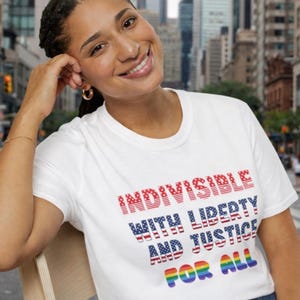 Indivisible Liberty Unisex T-Shirt: LGBTQ Pride, Social Justice Wear