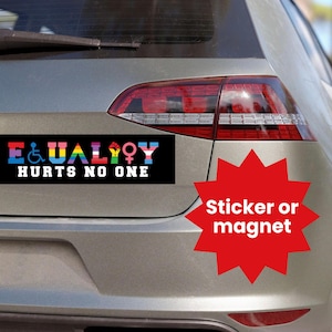 May include: A black and white bumper sticker with the text "EQUALITY HURTS NO ONE" and a variety of colorful symbols representing different identities. The sticker is on the back of a silver car. A red starburst sticker with the text "Sticker or magnet" is on the car's bumper.