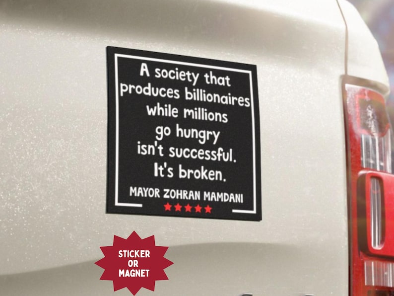 May include: Black rectangular sticker or magnet with white text: "A society that produces billionaires while millions go hungry isn't successful. It's broken." Signed by Mayor Zohran Mamdani. Red starburst graphic at the bottom.