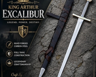 May include: A silver-toned steel sword with a cross-shaped guard and a textured pommel, accompanied by a dark brown leather scabbard with straps. The image features text reading King Arthur Excalibur, Legend. Power. Destiny., Hand Forged Carbon Steel.