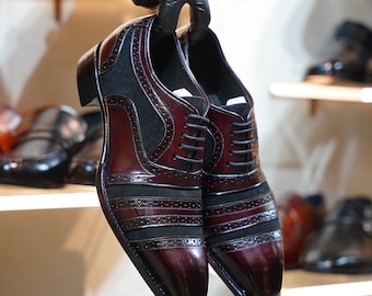 Zapatos Oxford bicolor de piel: Elegancia artesanal en ante y piel de vacuno