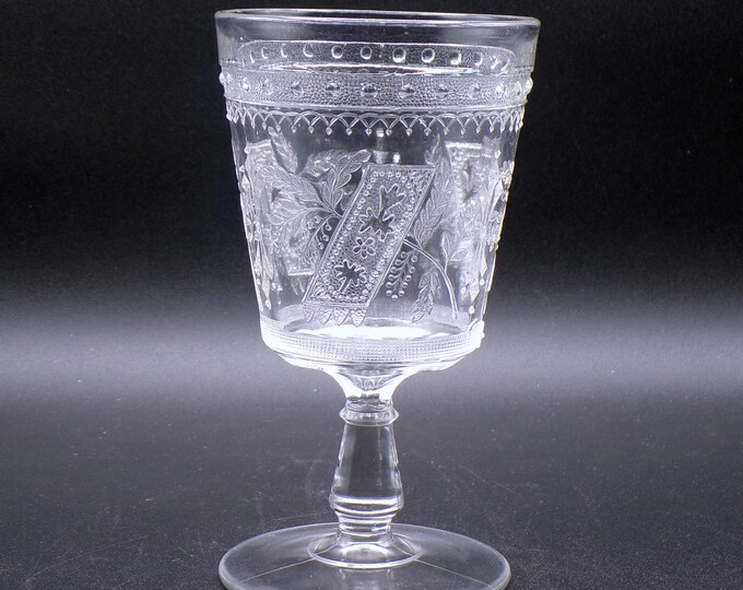 Early American Pressed Glass Water Goblet, Adams And Company, Prayer Rug (AKA) AKA Good Luck; Horseshoe; Prayer Mat; Wheelbarrow; 1881
