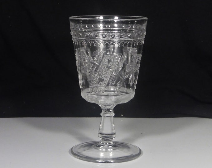 Early American Pressed Glass Water Goblet, Adams And Company, Prayer Rug (AKA) AKA Good Luck; Horseshoe; Prayer Mat; Wheelbarrow; 1881