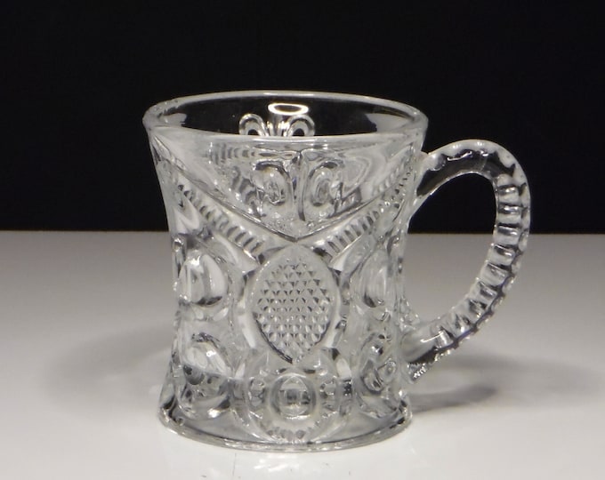 Early American Pressed Glass Mug, Bryce, Higbee And Company; Fleur-De-Lis (OMN) AKA Arched Fleur-De-Lis; Fleur-De-Lis Intaglio c 1898