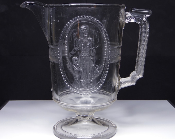 Early American Pressed Glass Pitcher; Richards And Hartley Glass Co; R H #500 (OMN) AKA Cupid And Venus; Guardian Angel; Minerva c 1880