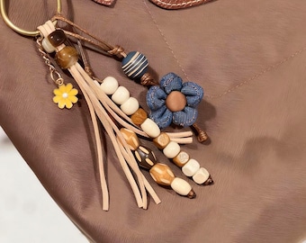Charm de sac bohème en daim perlé avec fleur en jean, porte-clés en perles fait main