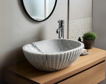 Regal Carrara Marble Sink – Sculpted Oval Fluted Vessel for Luxury Bathrooms